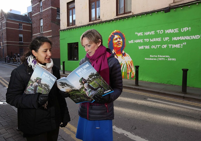 Bertha Zúñiga Caceres, daughter of environmental activist Berta Caceras murdered in 2016, is pictured with Trócaire CEO Caoimhe de Barra at a mural of her mother at the launch of Trocaire's Lenten campaign in Dublin. PHOTO: Mark Stedman / Trócaire