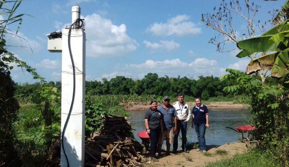 Israel Ochoa Barrios (third from left) is the president of COLRED in his community. He is responsible for monitoring the system from a monitor in his workshop. He also takes daily walks along the river to observe the conditions, keep the sensors clear and make sure they are working properly