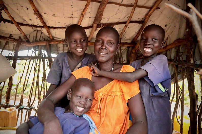 Ajak and her family feature on this year’s Trócaire box. They are one of millions of South Sudanese families displaced by war in their country. Photo : Achuoth Deng