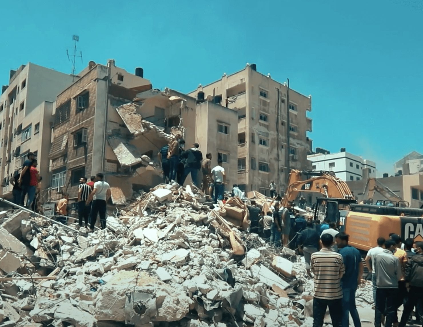 On May 16, 2021, Israeli raids targeted three residential buildings on Al-Wehda Street in central Gaza City. Credit: Women’s Affairs Centre