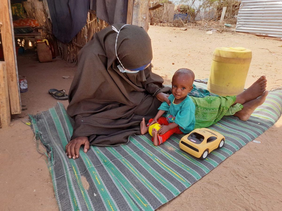 Gabey Issak with her son Abdi during a follow-up home visit in the Jazira IDP camp in Luuq district, Gedo, Somalia. Photo: Trócaire 