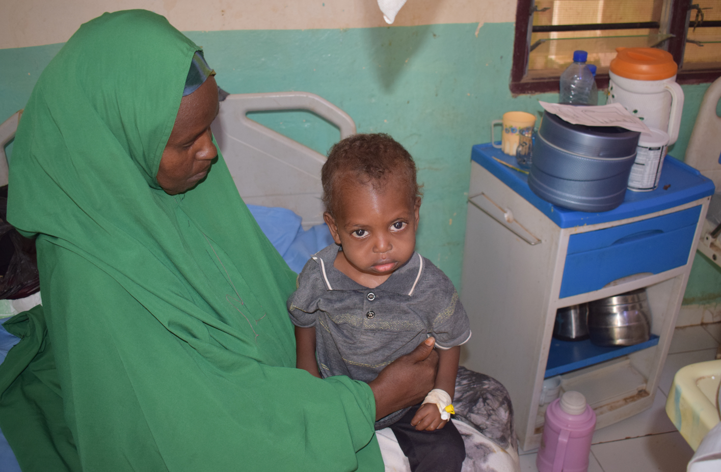 Fadumo Islow with her two-year-old son, Mohamed, in the Trócaire-run hospital in Luuq, Gedo Region, southern Somalia after eight days of treatment. Photo: Trócaire